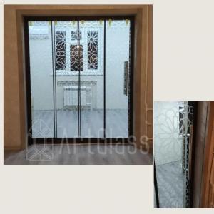 Стеклянные раздвижные двери