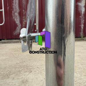 Fasad iskala, galvanizli, taxta bilan qoplangan